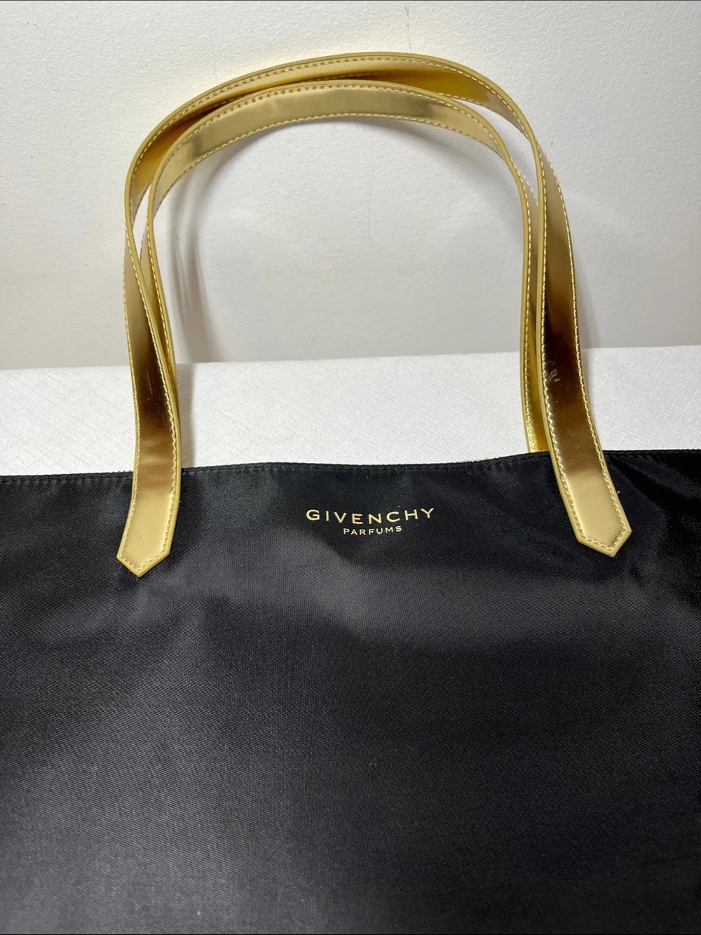 Givenchy Parfums Black Tote with Gold Handles and Star Zipper. 
New